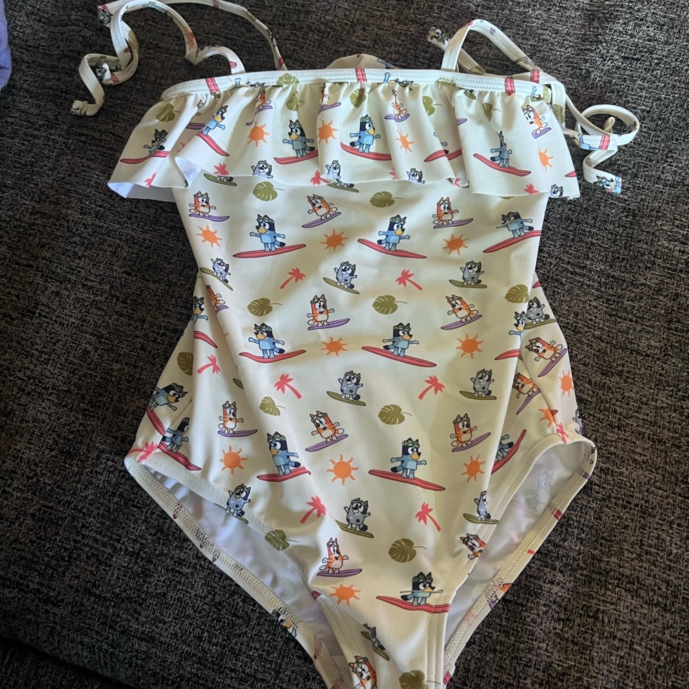 Kids bluey swim suit. New, never worn! Size 8/9 (see notes)